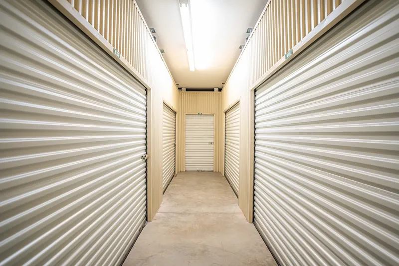 Indoor storage hallway with secure roll-up units